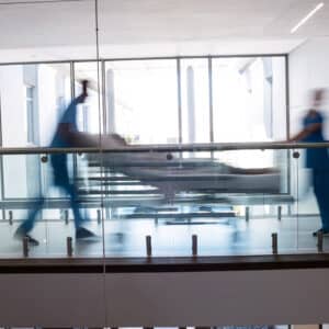 team of doctors taking pregnant woman to operation theatre in the hospital
